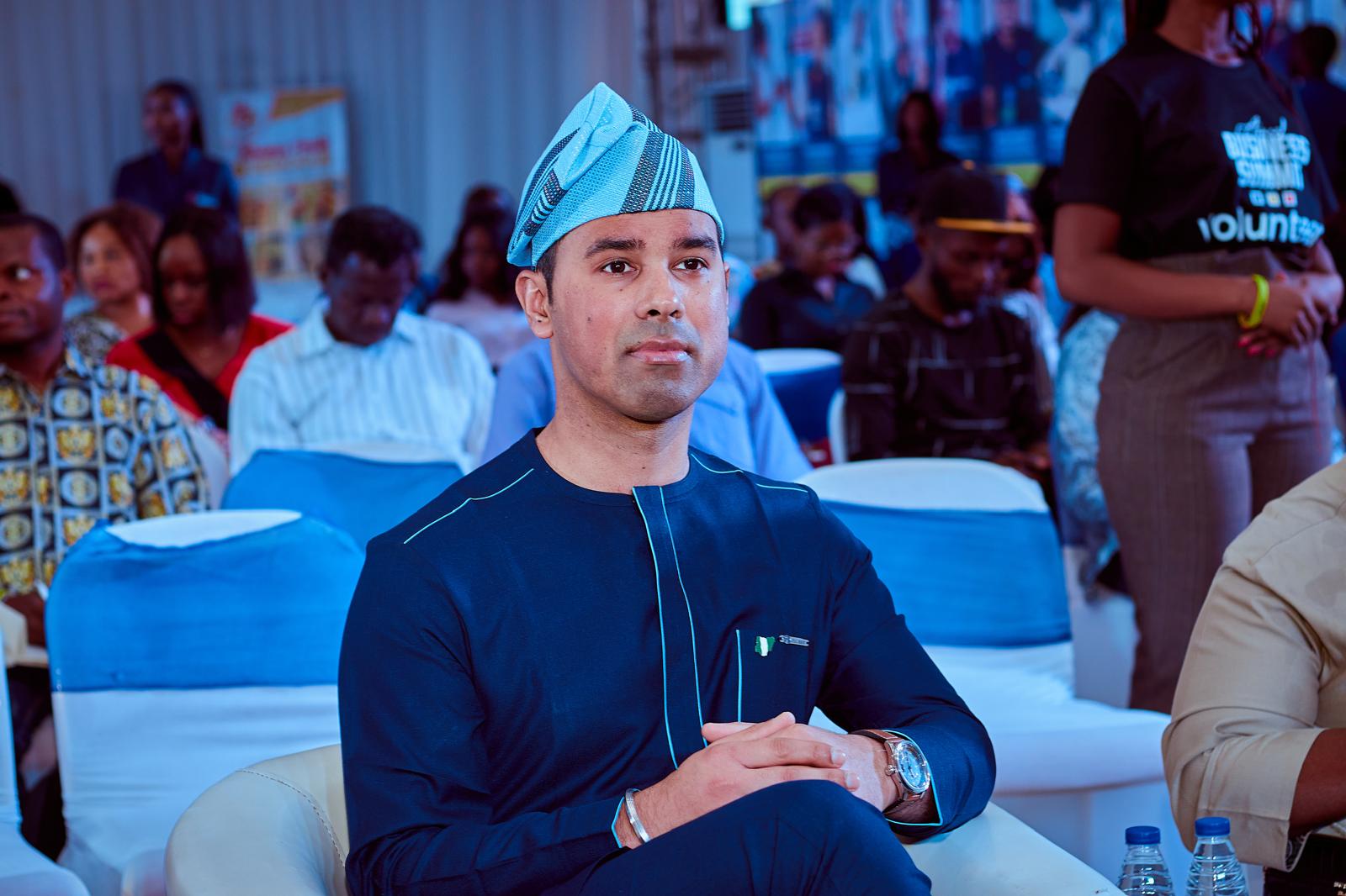 Rishi Harani sitting in an event